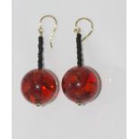 Baltic amber drop earrings, 9ct yellow gold hooks with black bead deocation