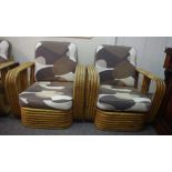 Two 1960s cane lounge chairs 77cm wide approx