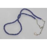 Tanzanite and silver necklace with pearl drop at back of neck