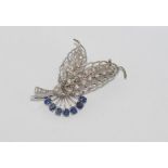 18ct white gold, diamond and blue stone brooch stone tests suggest spinel, weight: approx 8.1 grams