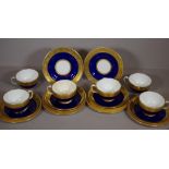 Mintons part tea service in cobalt blue with acid etched gilding. Comprising six each cup, saucers