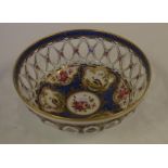 Crown Staffordshire pierced bowl with blue ground and Chelsea birds, painter Hagan, 18.4cm diameter,