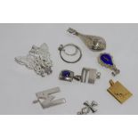 Various decorative silver pendants