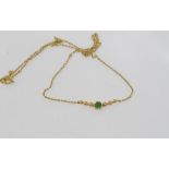Delicate 18ct yellow gold and emerald necklace weight: approx 2.8 grams
