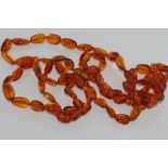 Opera length honey amber necklace