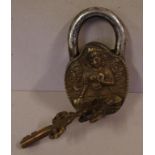 Ornate figural padlock with 2 keys, 10.5cm high approx.