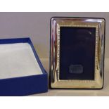 Sterling silver picture frame hallmarked Sheffield circa 2000, 12cm X 9cm approx