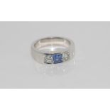 18ct white gold Ceylon sapphire and diamond ring comprising 4.5mm Ceylon Sapphire and 2 princess cut