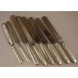 Six sterling silver handled dinner knives & 2 entree knives, marks rubbed, as inspected