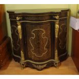 Superb ebonised boulle serpentine cabinet with marble top above an exquisite brass inlay figural