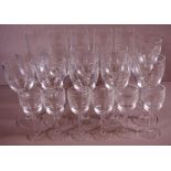 Part suite of etched wine glasses including champagne flutes, wine glasses etc, (22)