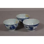 Three Chinese Qing blue & white tea bowls T'ung Chih period, exports seals attached. 6cm diameter