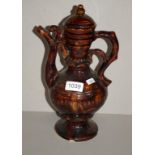Antique brown glaze pottery ewer 30cm high.