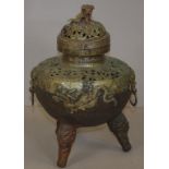 Chinese spelter tri footed Censor with in relief dragon decoration and foo dog lid, H27cm approx