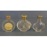 Three Lalique/Nikki Ricci perfume bottles 5.5cm high (tallest) approx.