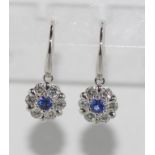 18ct white gold diamond cluster drop earrings comprising Ceylon sapphires and total 14 diamonds 12 =