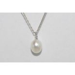 18ct South sea pearl & diamond pendant comprising 11.5mm pearl with 3 diamonds on silver chain
