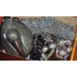 Box of costume jewellery together with compacts, belts and a large bird