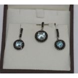 Silver and spinel pendant and earring set