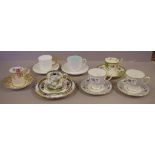 Seven assorted English coffee cups & saucers to include Royal Crown Derby, Royal Doulton, and