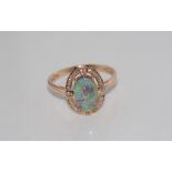 14ct rose gold, solid black opal & diamond ring weight: approx 2 grams, size: O/7
