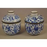 Pair of Chinese blue & white porcelain lidded jars 18cm high
