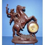 American spelter figural mantle clock horse with rider, 41cm high approx.