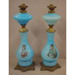 Pair of French blue glass & ormolu oil lamps illustrated with Napoleon and Josephine Bonaparte, 57cm