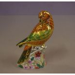 Royal Crown Derby "Sun Parakeet" paperweight with gold button seal to base,15 cm high approx.