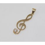 9ct yellow gold treble clef pendant with glass, weight: approx 3.3 grams