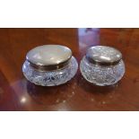 Two sterling silver lidded crystal jars hallmarked Birmingham 1905, 13 cm diameter (largest)