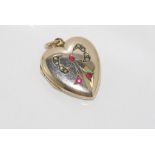 Delicate 9ct heart shaped locket with stone set bow on front and plain back, weight: approx 4.1