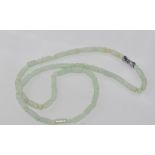 Light green jade necklace with long and round beads