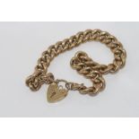 Hallmarked 9ct gold bracelet with heart lock weight: approx 18.9 grams