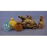 Three Chinese snuff bottles 7cm high (tallest) approx., a stone chop & a carved stone water