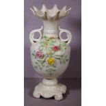Large Belleek twin handle vase with raised floral decoration, H32cm approx