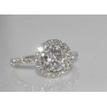 18ct white gold and diamond ring set with a centre brilliant cut diamond TDW 0.95ct Colour E,