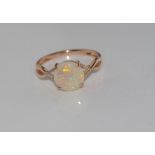 14ct rose gold, solid white opal & diamond ring weight: approx 1.8 grams, size: N/6-7