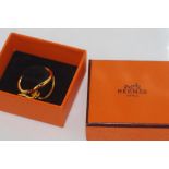 Boxed Hermes brass scarf ring marked Hermes SCLP and in original box