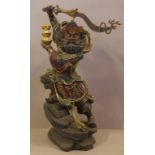 Tibetan carved timber Makahala figure with bronzed metal dagger held above head, H72cm approx