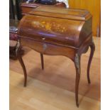 French Louis XV style cylinder top bureau with marquetry inlay, ormolu mounts, a drawer and cylinder