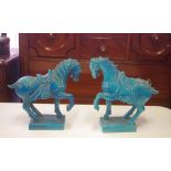 Pair of Tang style blue glaze horses 27.5cm high approx