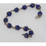 Silver and lapis ball bracelet