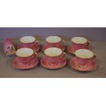 Six Royal Winton "Petunia"cups and saucers together with a toast rack