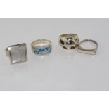 Four various silver rings tested as silver but not all marked