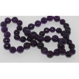 Matinee length facetted amethyst necklace