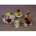 Five floral encrusted china ornaments to include Aynsley, and Coalport