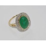 18ct two tone gold, emerald and diamond ring emerald = 6.6cts, diamonds = 51pts, weight: approx 6.66
