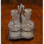 Three Georgian cut glass decanters one decanter chip to rim and stopper, 20cm high, with plated