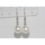 18ct South sea pearl & diamond drop earrings comprising 8 diamonds= 0.25cts, H/Si 1